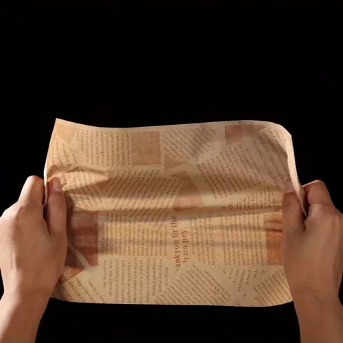 Újság mintájú zsírpapír, csomagoló papír – 25 cm × 35 cm – Barna